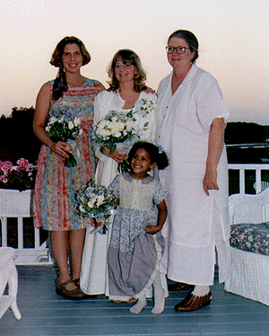 Photo of Marilyn with daughters Corriander, Elizabeth, and Sarah